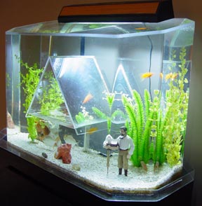 Fishure Safe Haven fish tank, with Atrus action figure in the front